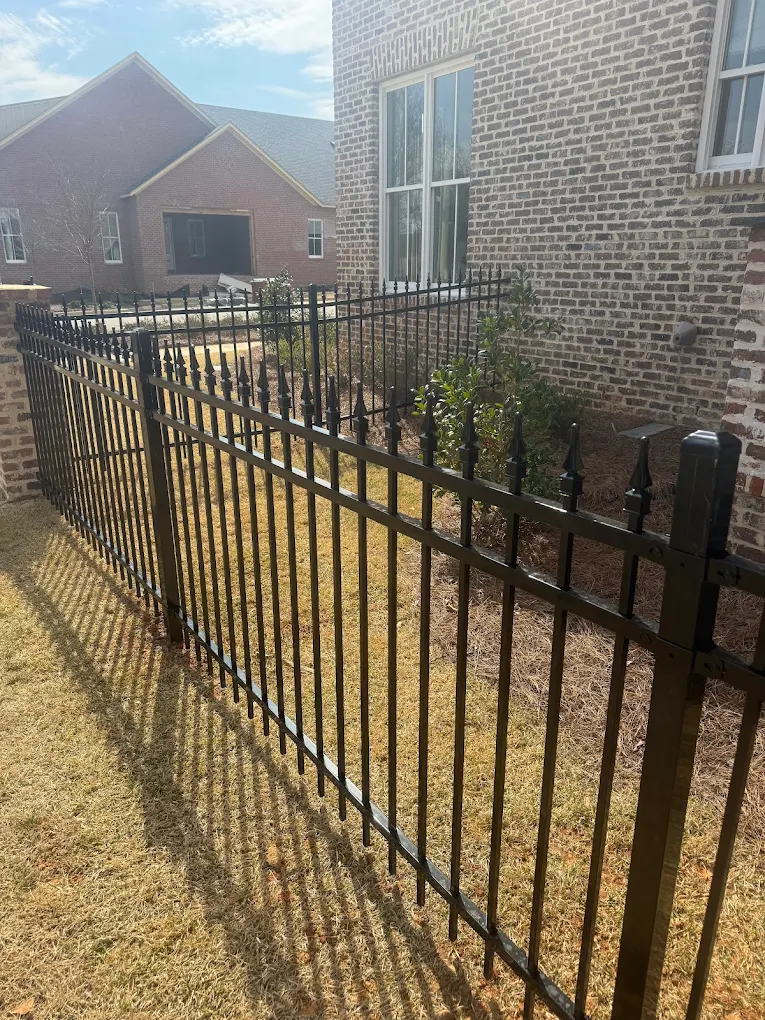 Ornamental aluminum fence with spear top detail - Starkville MS residential fence installation
